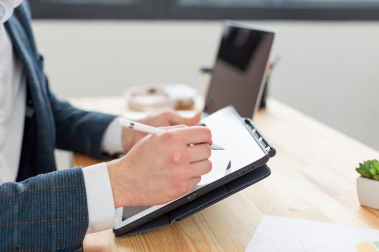 close-up-individual-working-office_23-2148499914 (1)