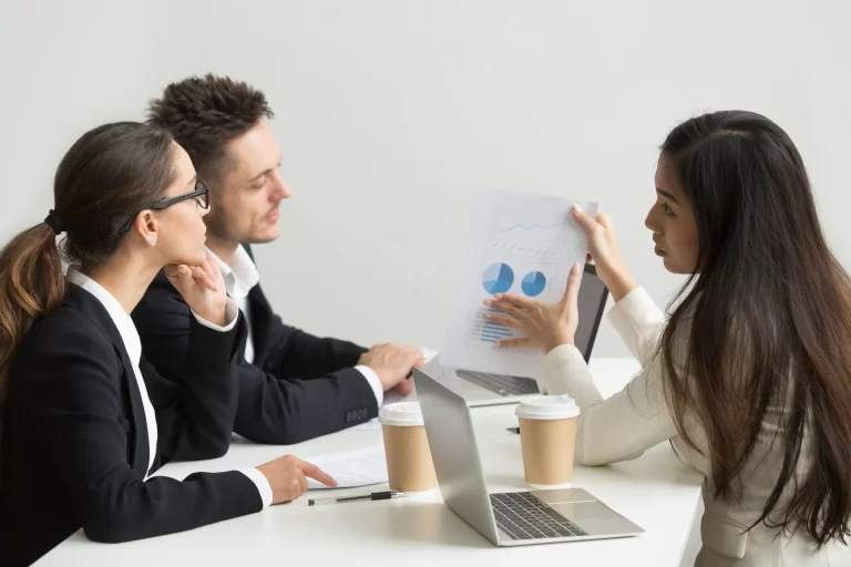female-worker-presenting-visual-templates-coworkers copy